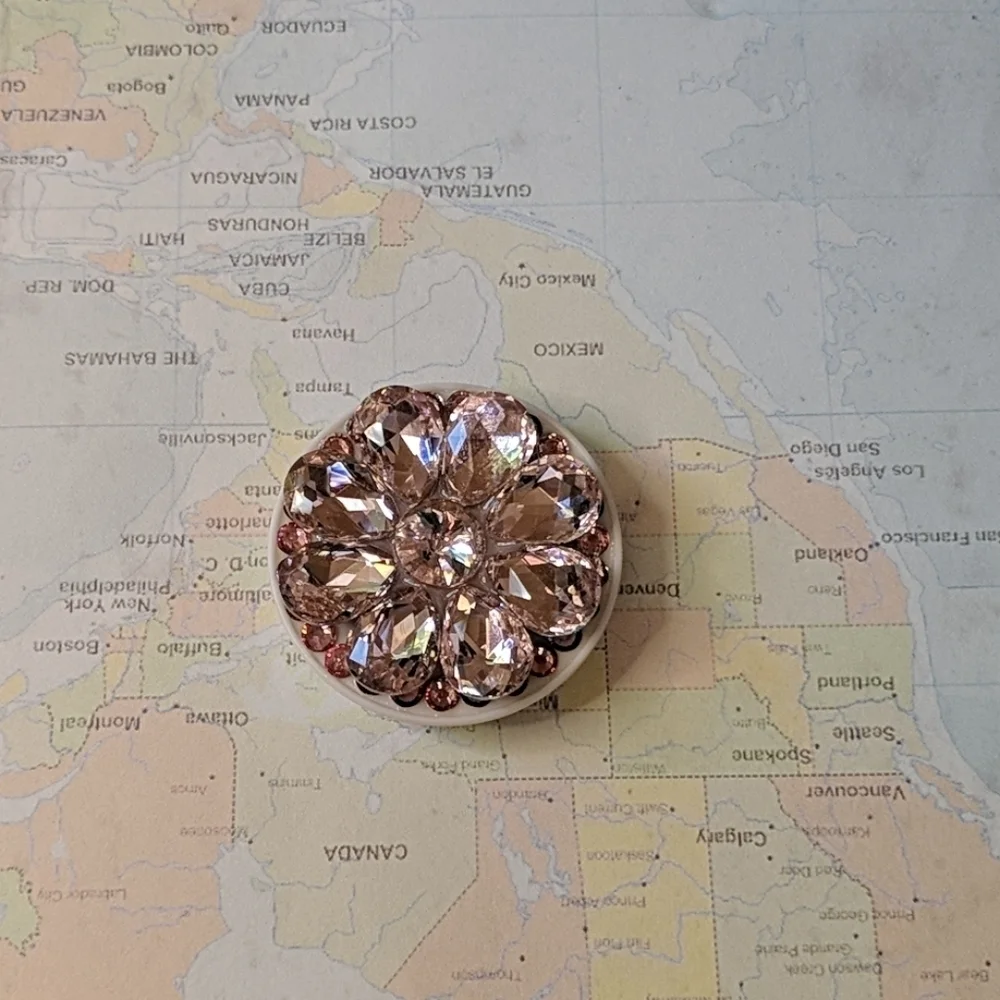 Pink bejeweled phone holder